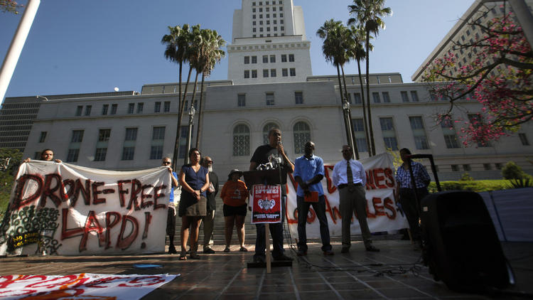 Activists seeking to limit the use of drones by law enforcement protested on the south steps of City Hall. (Bob Chamberlin / Los Angeles Times)